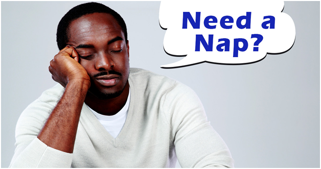 Do you need a nap? Man sleeping at his desk.