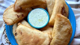 plate with fried Corn flour empanadas from Venezuela