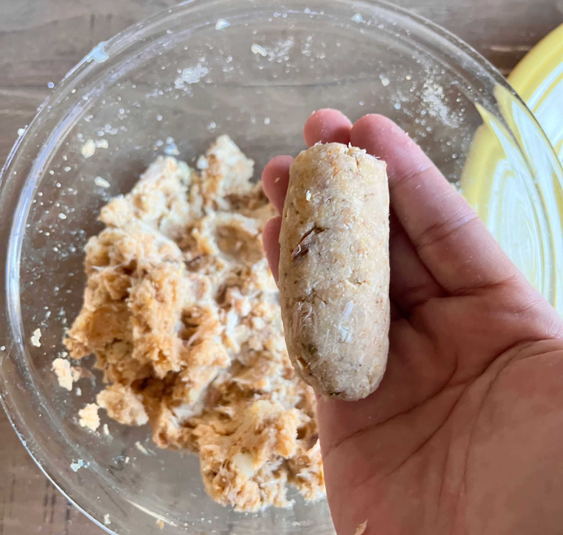 Making  tuna croquettes cylinders 