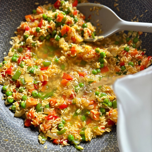 deglazing yellow mahatma rice with splash of white wine 