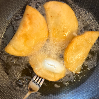 frying empanadas in HexClad pan