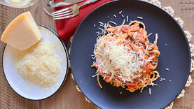 "Delicious Easy Pasta With Sardines, showcasing a vibrant dish featuring pasta tossed with flavorful sardines, garnished with fresh herbs, olive oil, and a sprinkle of seasoning. The photo captures the colorful ingredients and presents a mouthwatering takeaway on enjoying simple, nutritious meals inspired by Sicilian cuisine."