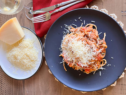 "Delicious Easy Pasta With Sardines, showcasing a vibrant dish featuring pasta tossed with flavorful sardines, garnished with fresh herbs, olive oil, and a sprinkle of seasoning. The photo captures the colorful ingredients and presents a mouthwatering takeaway on enjoying simple, nutritious meals inspired by Sicilian cuisine."