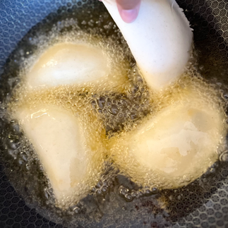 frying empanadas in HexClad pan