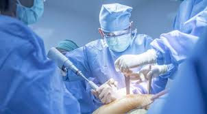Surgeon performing hip surgery