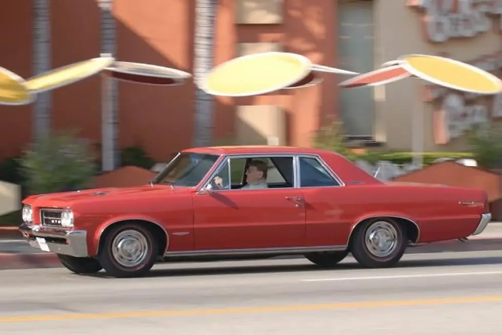 “The Red Car” with Rear Mount Antennae & Bobcat Emblem - Jim Wangers at the wheel!