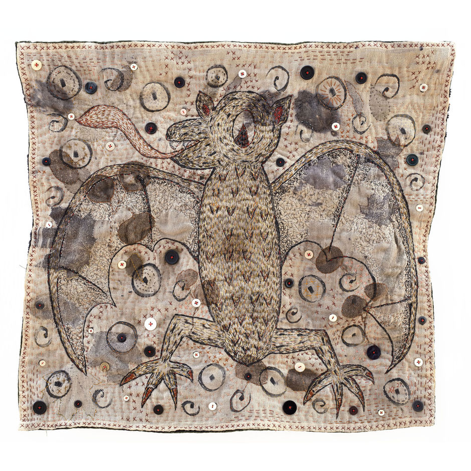 Stitched bat with a long tongue on cotton dyed with black walnut and then eco dyed. Embellished with vintage buttons.