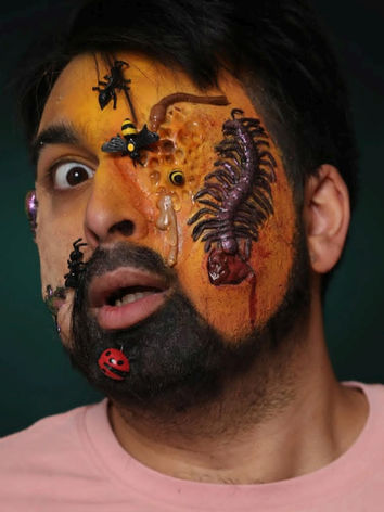 Special effects makeup - man with bugs on his face and a closed up eye