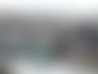 A military ship looming in a harbour