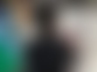 Monika M. Pickett in a motorized wheelchair in the grocery store.