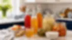 Fermented beauty ingredients with kombucha, sauerkraut, kimchi, and kefir in a romantic navy blue kitchen.