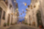 alleyway-in-alberobello-italy-at-twilight-2025-03-24-00-29-28-utc.jpg