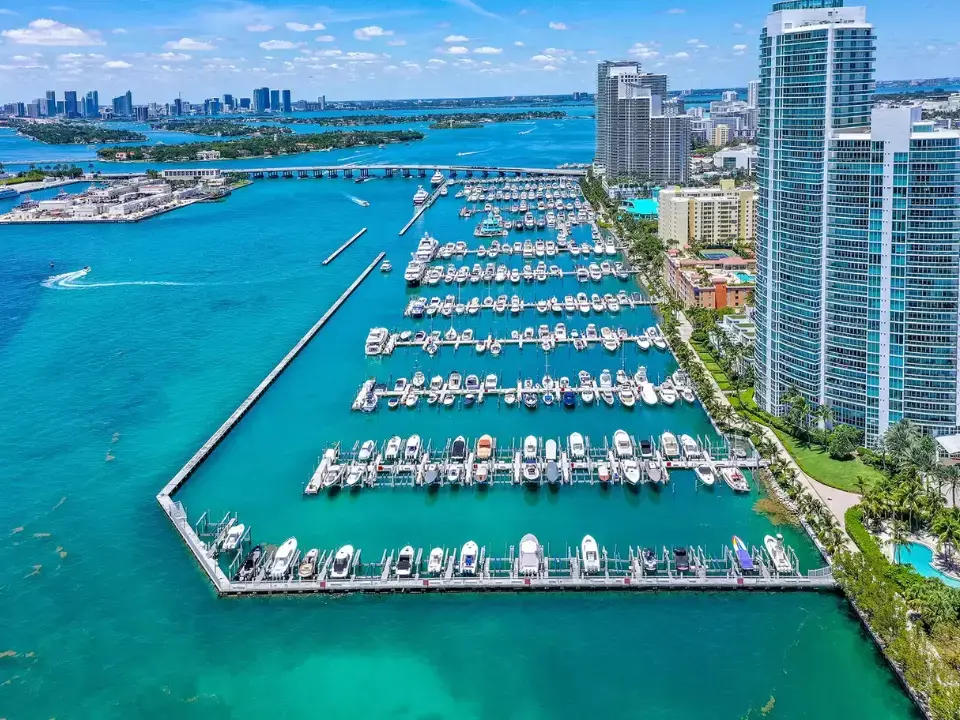 View of Miami Beach Marina with yachts docked and clear skies, ideal departure point for bachelorette boat parties