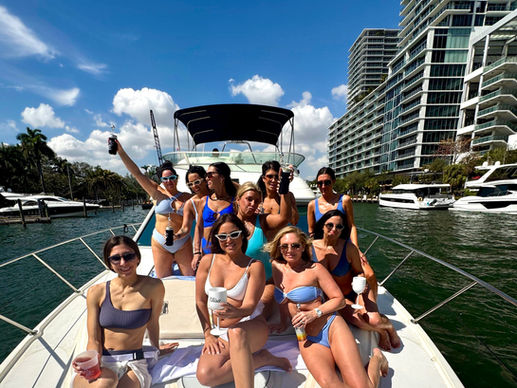 Private bachelorette party on a yacht in Miami enjoying a customized celebration experience