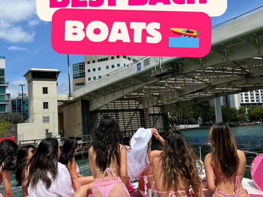 Group of bachelorettes on a Miami boat party cruising the river, posing with a “Miami Best Bach Boats” sign on the bow — Vice Boat Club experience.