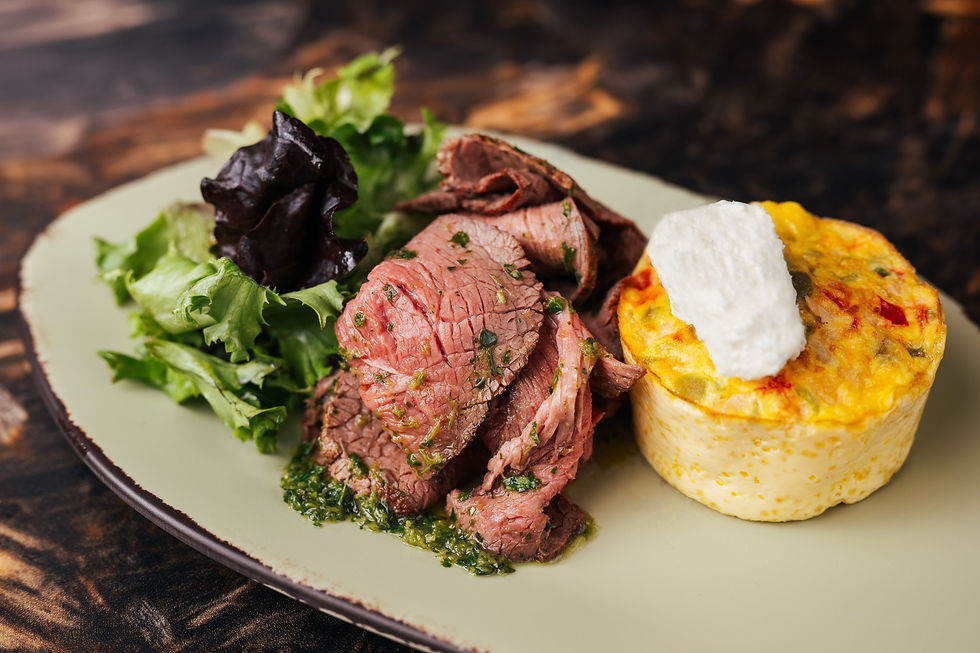 Vegetable-Goat Cheese Frittata with wood-fired beef tossed in chimichurri -Disney