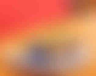 Fish tacos with fries on a floral plate, blue taco holder. Lime garnish. Set on a wooden table, red background adds warmth.