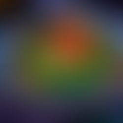 A seasoned chicken breast on mashed potatoes, garnished with green beans and crispy onions on a blue plate. Background is dark with purple tones.