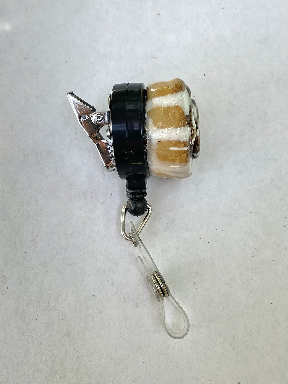 Thumbnail: Cinnamon Roll badge reel