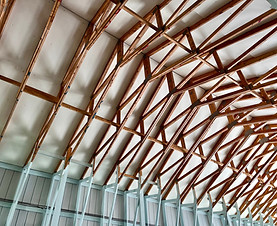 interior wooden beams inside our large boatshed