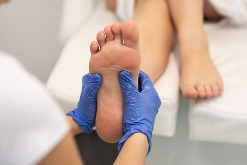 Foot Health Professional Treating a client's foot