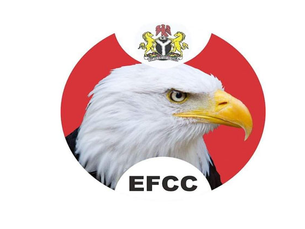 Bald eagle head with a serious expression on a red background, EFCC text below. Crest featuring eagles and a harp at the top.