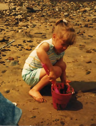 A picture of Vicky Glass at the beach when she was a child.