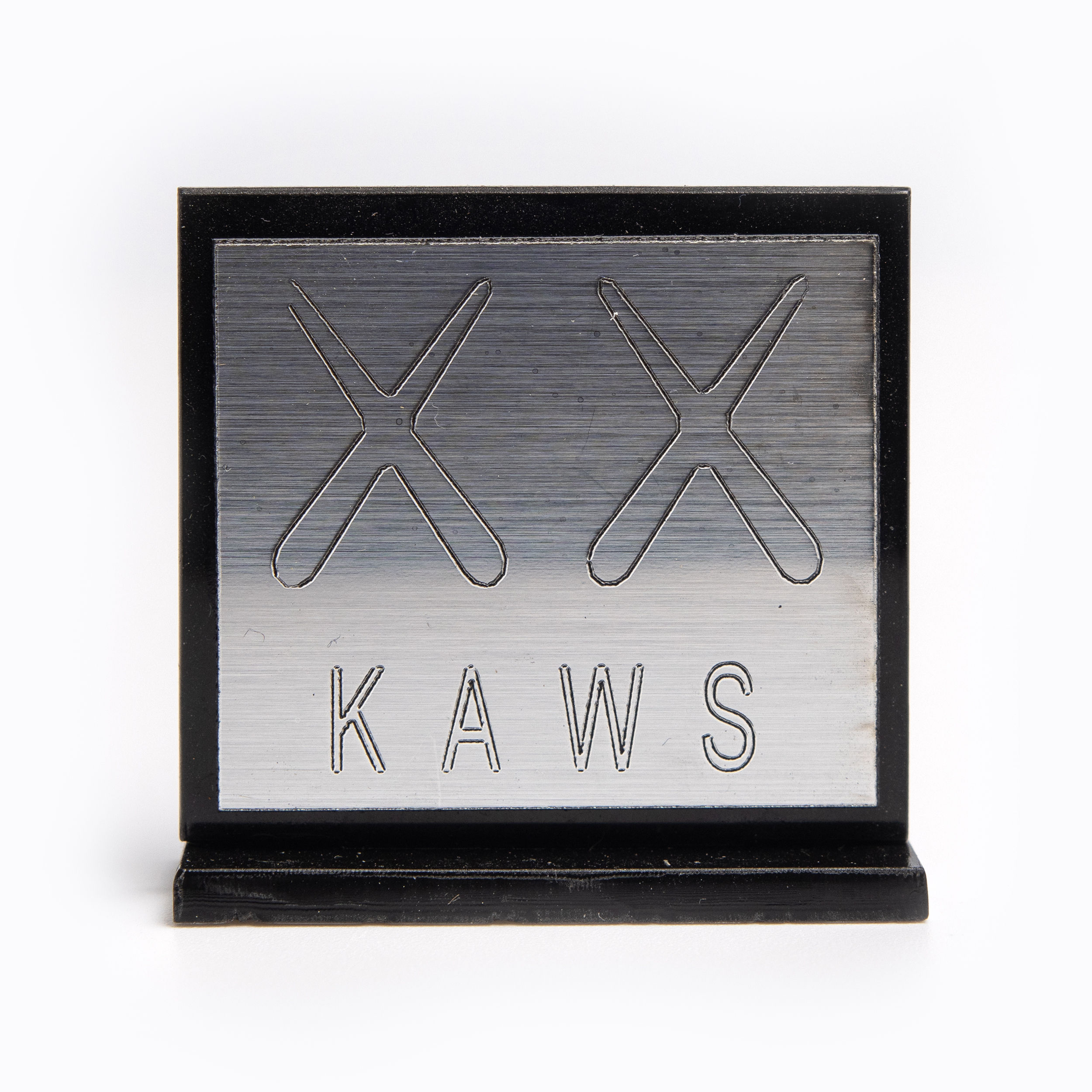 PLACA KAWS