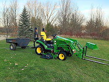 Grass being cut on a lawn mower