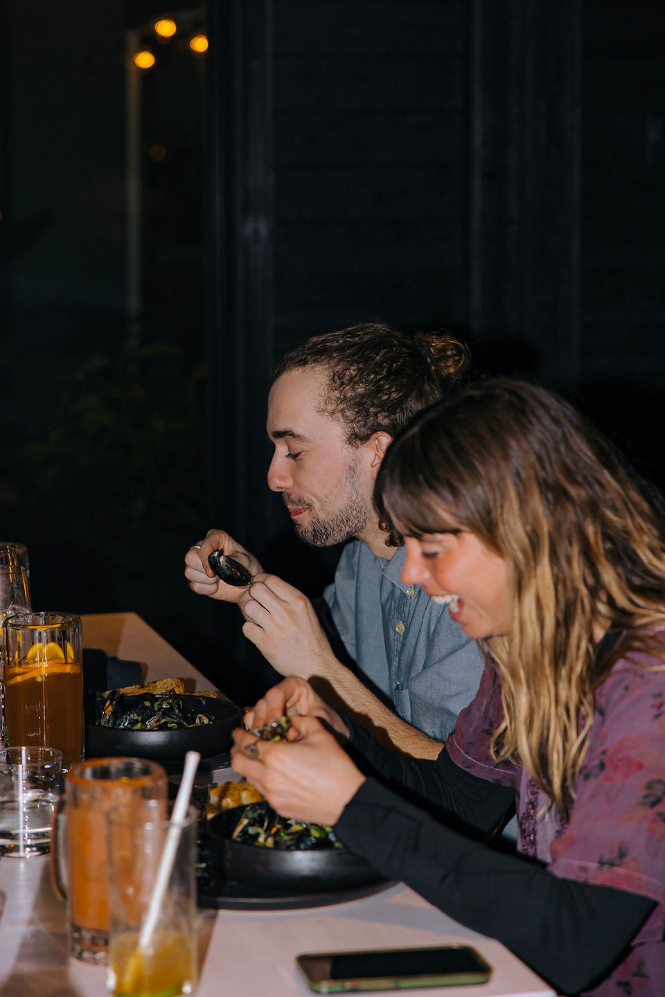couple dining together at The Bear Bierhaus restaurant in Tofino