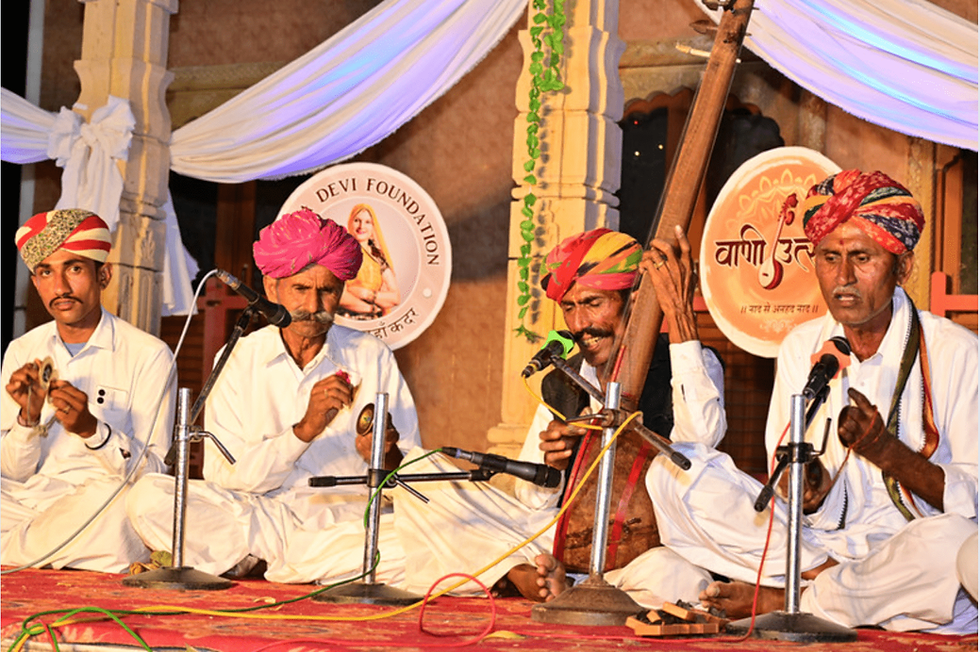 Musical performance by four men, Devi Foundation