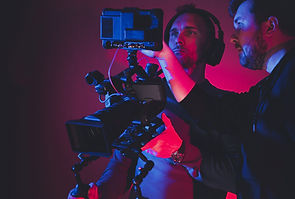 film-camera-crew-consulting-newly-taken-footage-2021-08-31-20-27-07-utc.jpeg