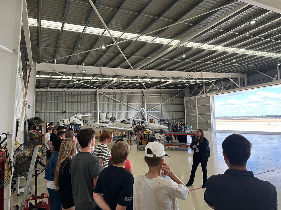 Students in flight hanger