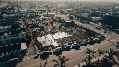 an aerial view of a construction site with a sign