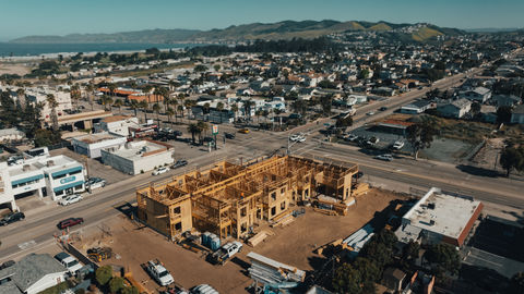 an aerial view of a building under construction in a city