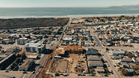 an aerial view of a construction site near the beach