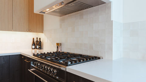 a stove top with a hood