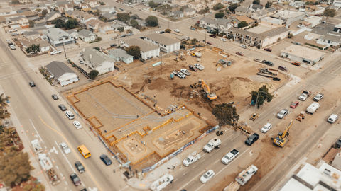 an aerial view of a construction site in a residential area
