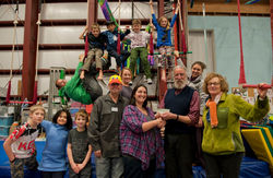 Friends of Sitka Circus Arts accepting a check from Sitka Rotary Club