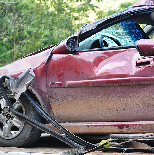 Damaged Red Car