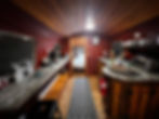The kitchen and dining area of the converted airstream