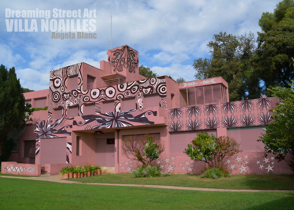 Dreaming Street Art VILLA NOAILLES Angela Blanc, pink building with detailed murals and greenery