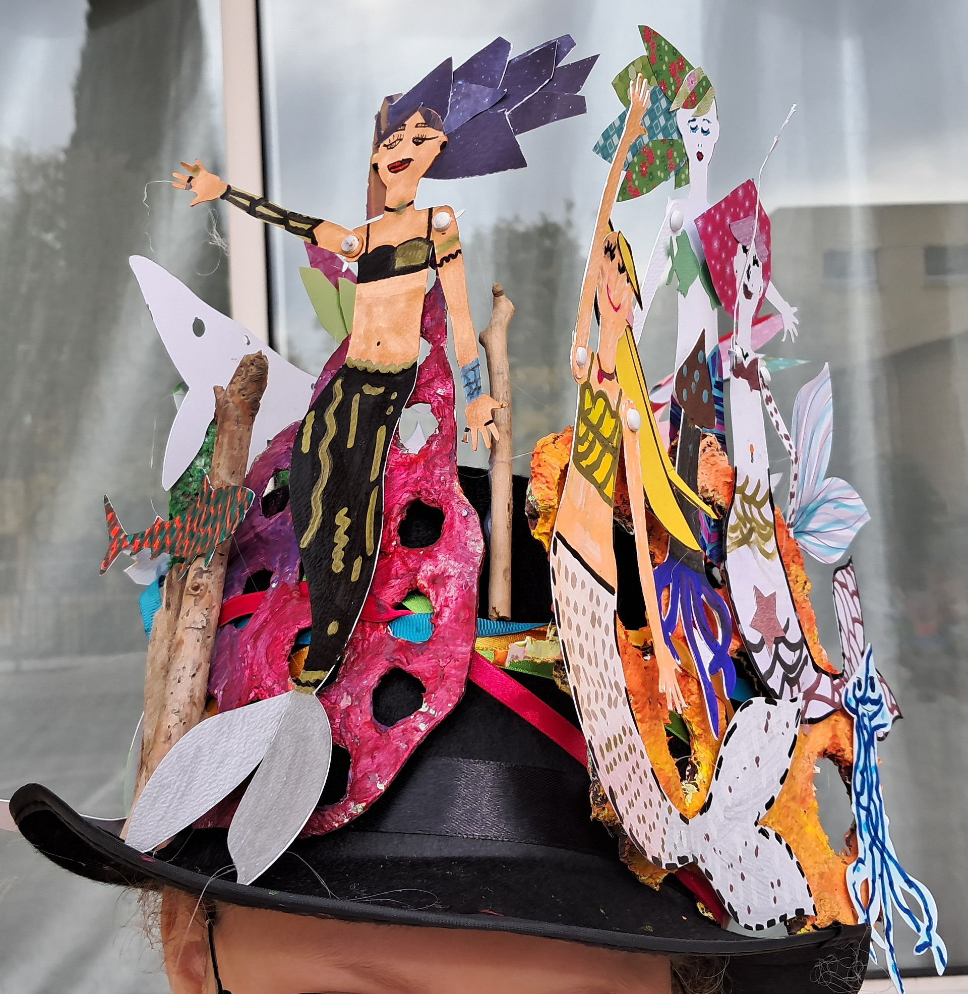 Hat decorated with paper art, woman figure, La Fabrique des monstres mythologiques, colorful details