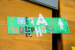 Panneau coloré "META MORPHOSES" avec le prénom Aurélia et Raphael, sur bois.