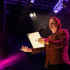 man performing onstage
