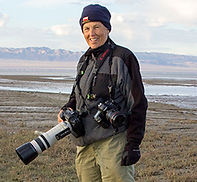 Wildlife Artist and Photographer S.K.Schafer with a captive Black Bear cub