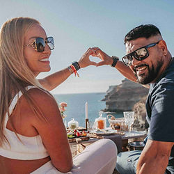 couple gathering hands in an heart shape