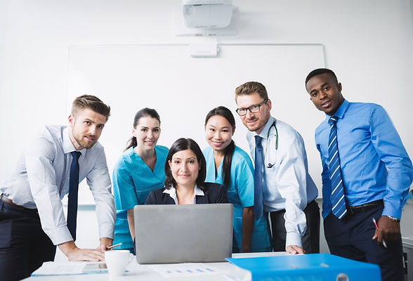 team doctors smiling in conference-room