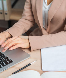 close-up-businesswoman-s-hand-typing-lap