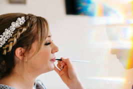 Applying bridal lipstick